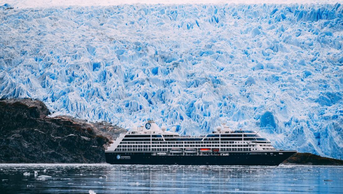 Azamara ship next to a glacier 